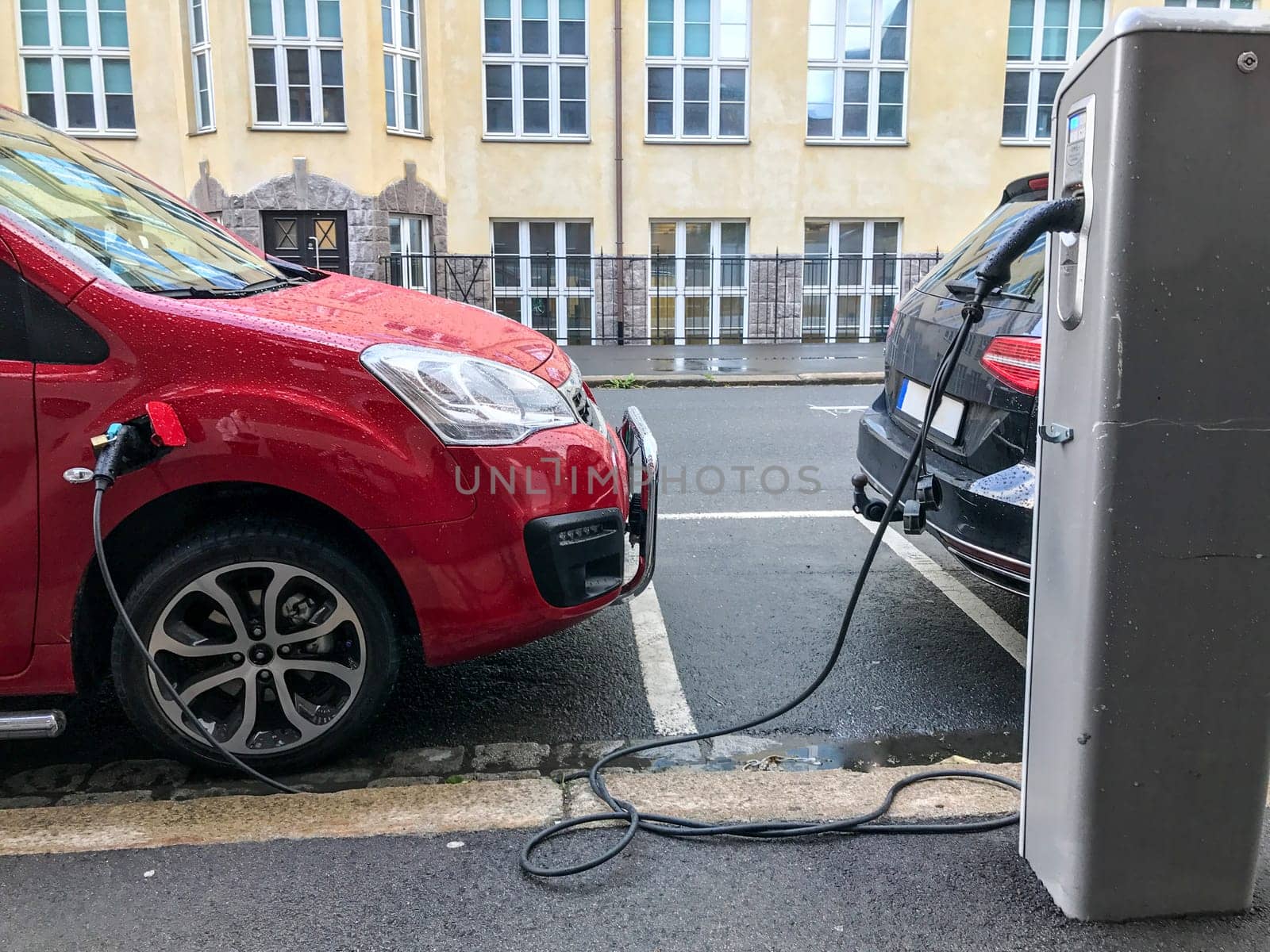 Electric car charging station in Oslo. Eco automobile that sparked a revolution