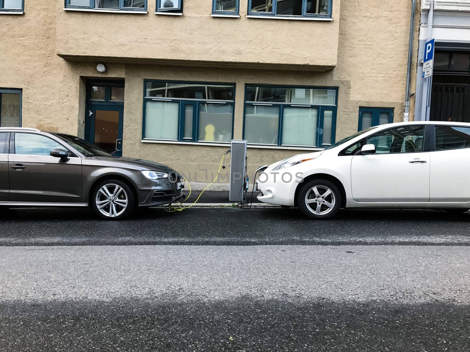Electric car charging station in Oslo. Eco automobile that sparked a revolution