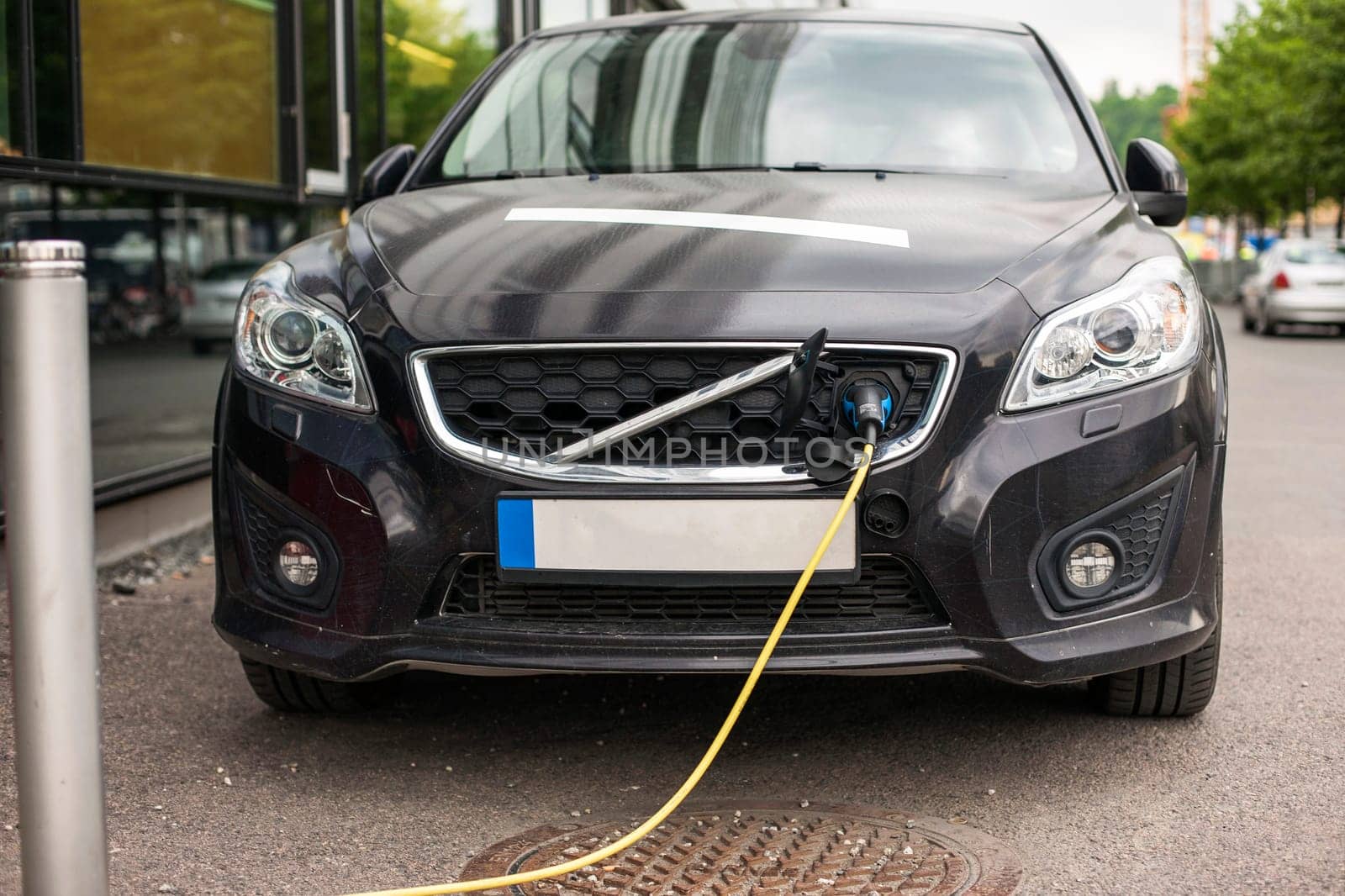 Electric car charging station in Oslo. Eco automobile that sparked a revolution