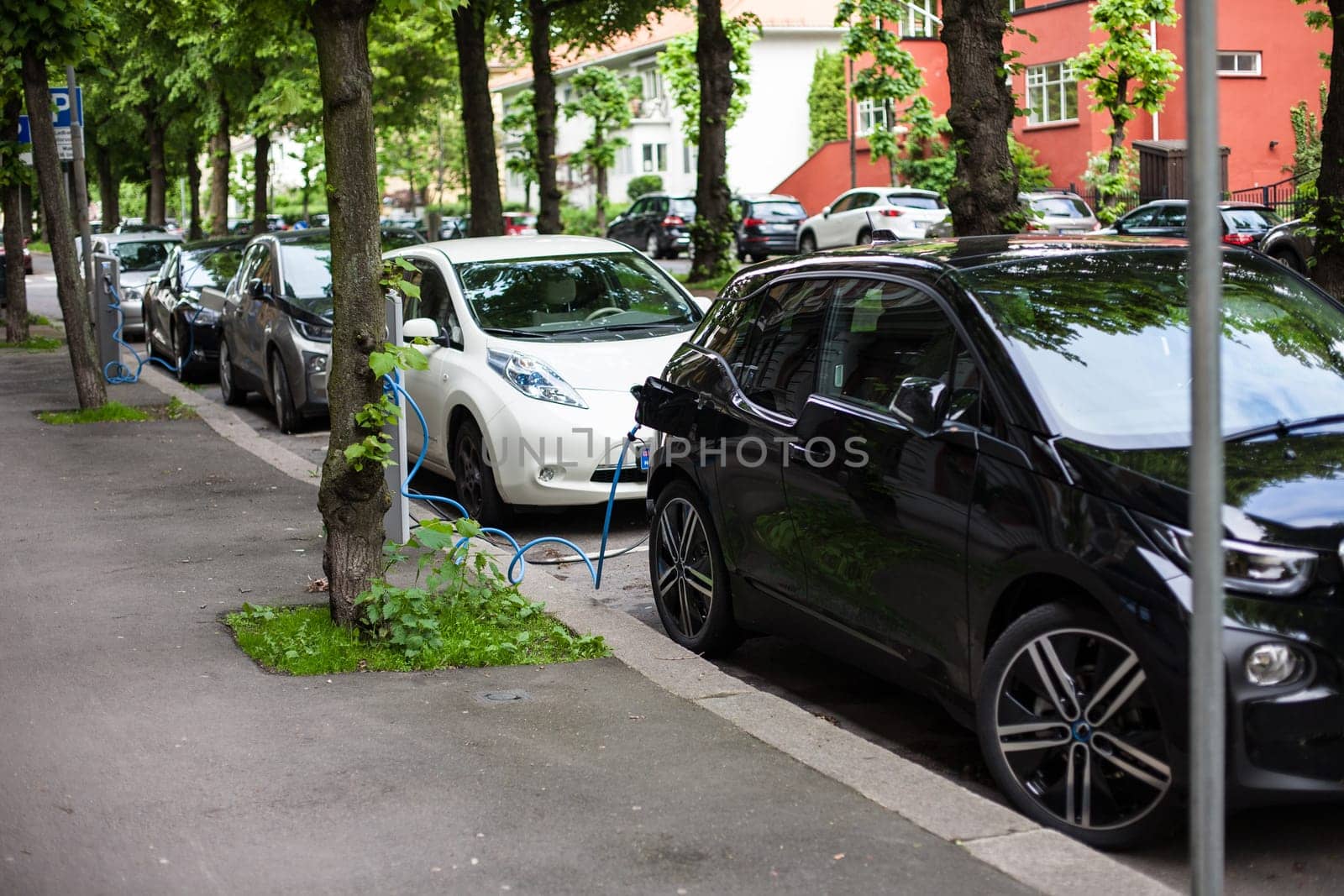 Electric car charging station in Oslo. Eco automobile that sparked a revolution