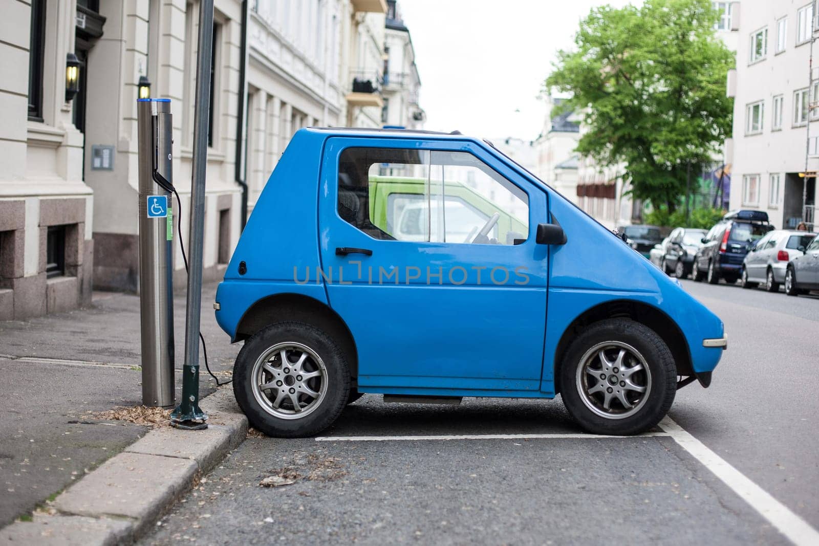 Electric car charging station in Oslo. Eco automobile that sparked a revolution