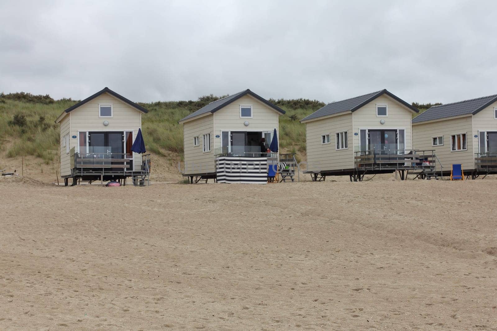 Netherlands 15 August 2015: Beach houses on the North Sea beach .