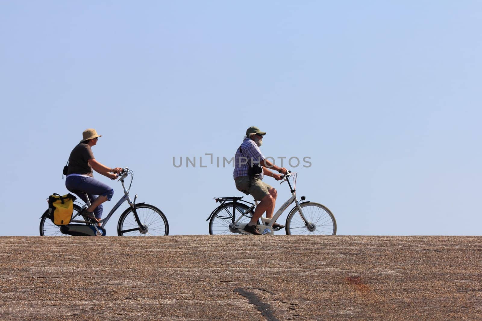 Netherlands 22 August 2015: Some cyclists on a trip into nature