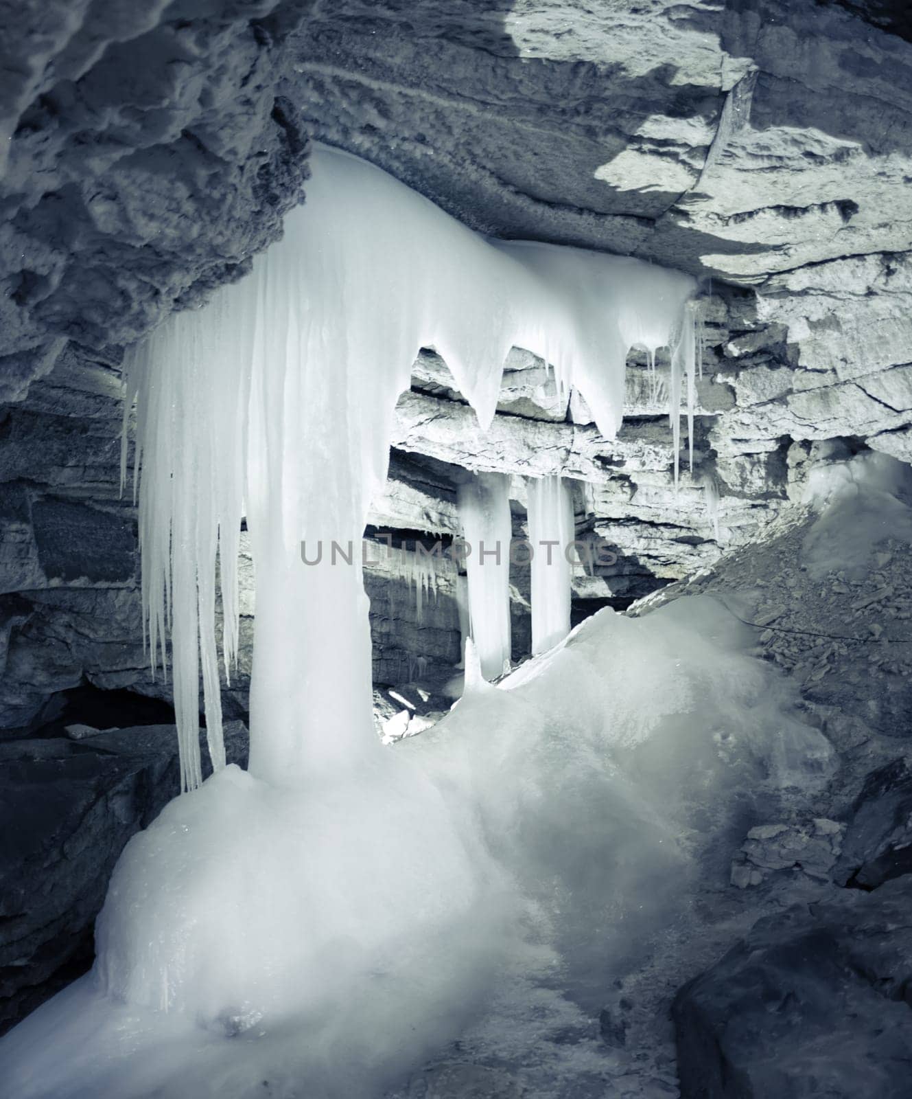 View of the ice cave with icicles. Kungur. Russia