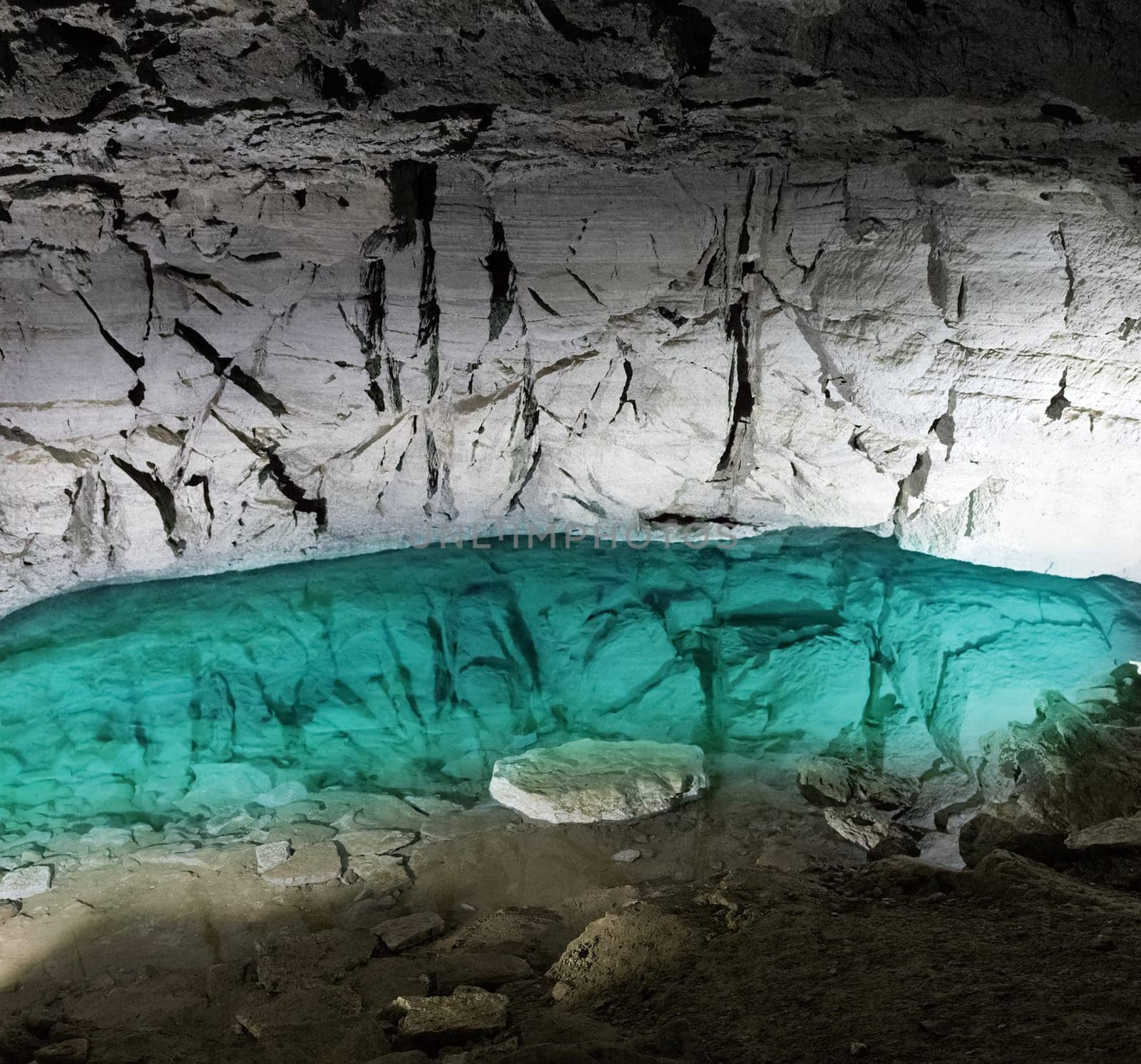 Underground lake in the ice cave. Kungur. Russia