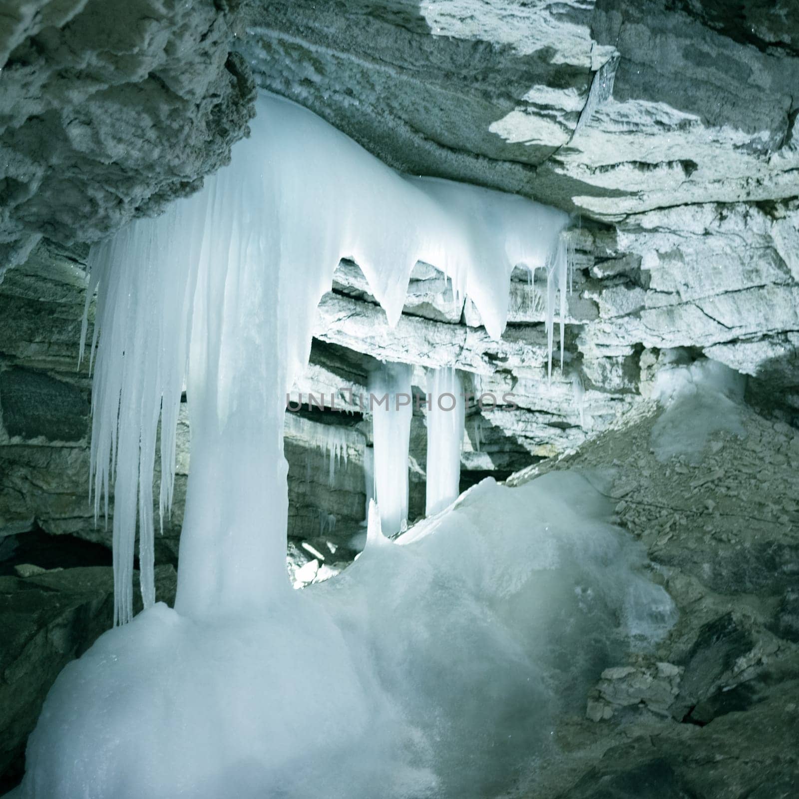 View of the ice cave with icicles. Kungur. Russia