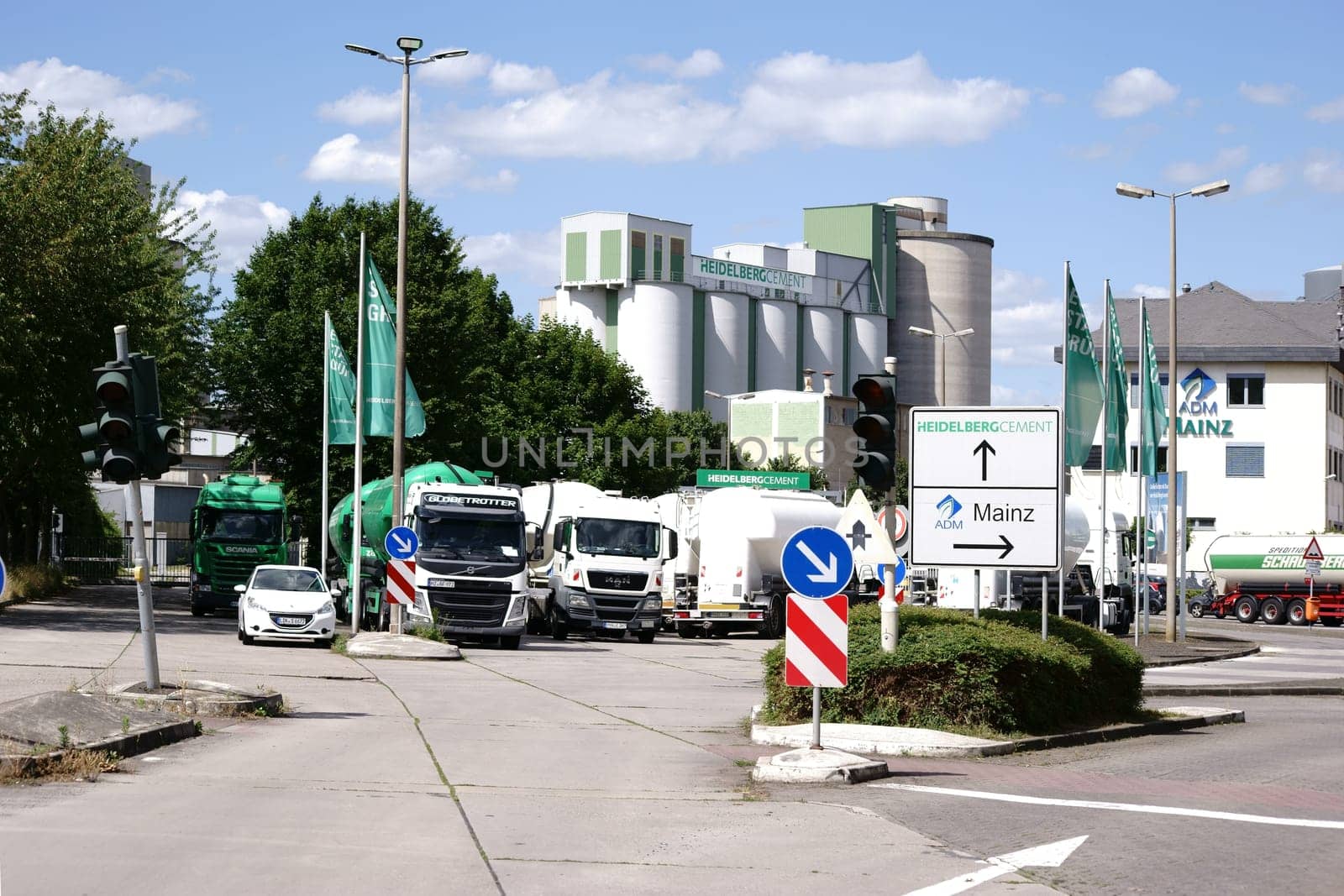 Mainz,Germany - June 10,2017: Trucks park in front of the entrance to the premises of Heidelberg Zement on June 10,2017 in Mainz.