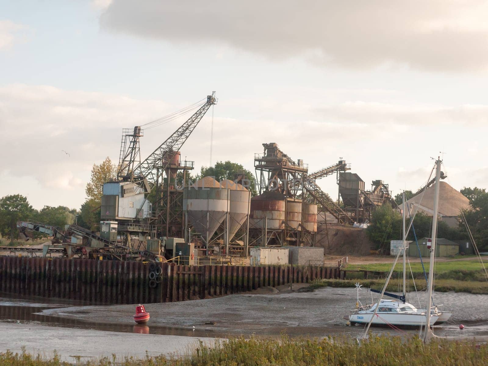sand industry materials quarry dock factory across river  England  Essex