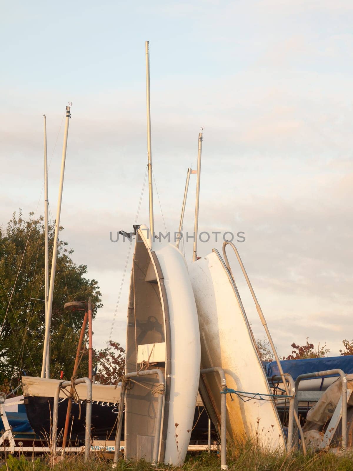 private dock yard scene sailing club boats stacked horizontal  England  Essex