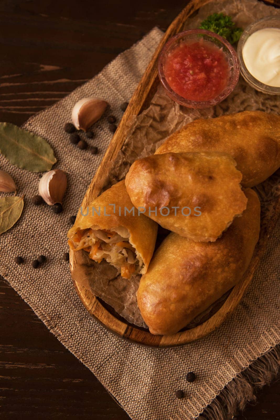 Different pies from meat and vegetables. Freshly baked cakes on a table