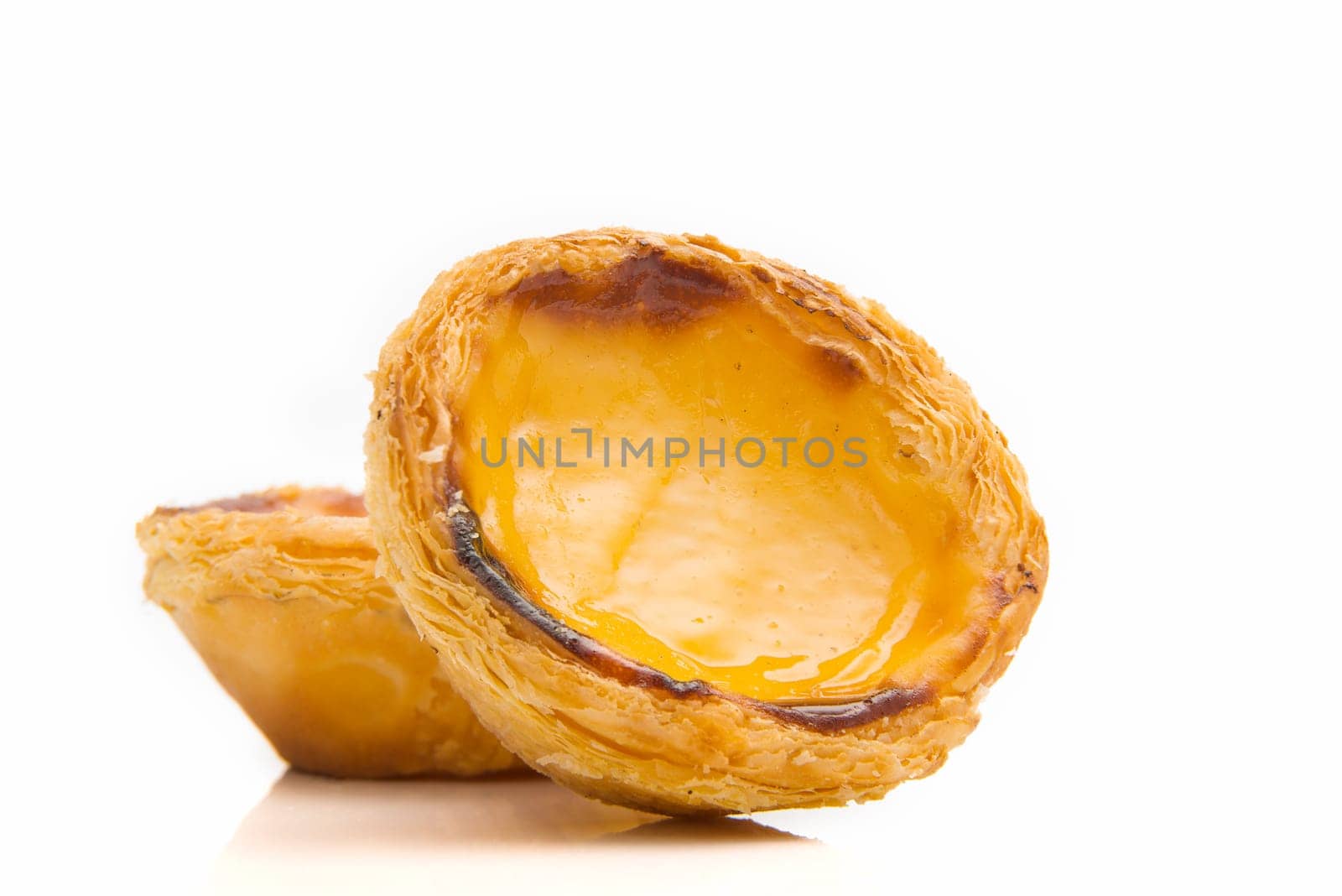 Egg Tarts or pasteis de nata isolated on white background. Typical portuguese sweet