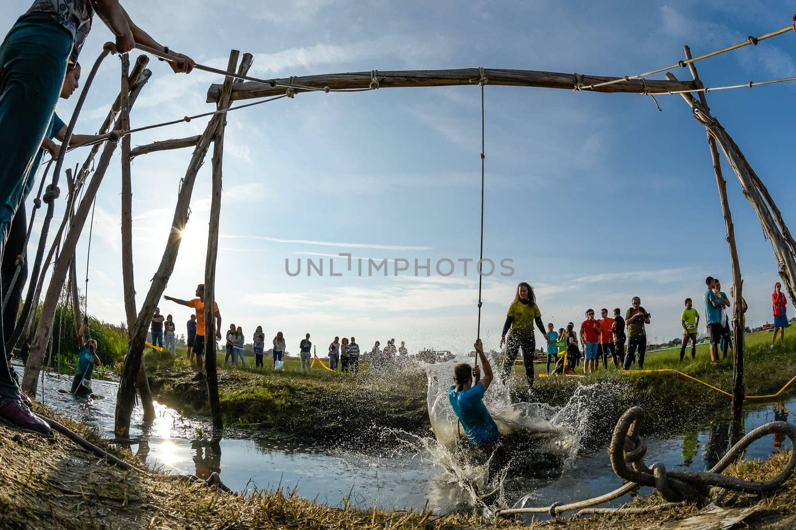 ESTARREJA, PORTUGAL - SEPTEMBER 23: Athletes go through mud and water at the Biorace on september 23, 2017 in Estarreja, Portugal.