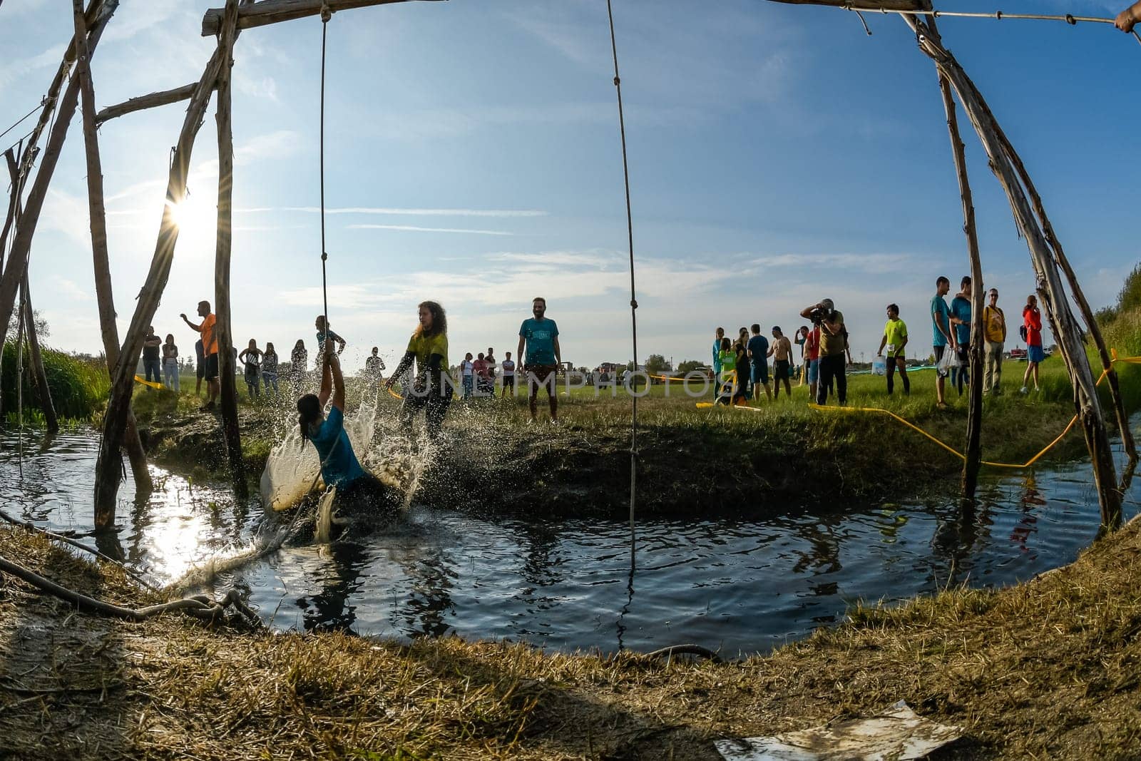 ESTARREJA, PORTUGAL - SEPTEMBER 23: Athletes go through mud and water at the Biorace on september 23, 2017 in Estarreja, Portugal.