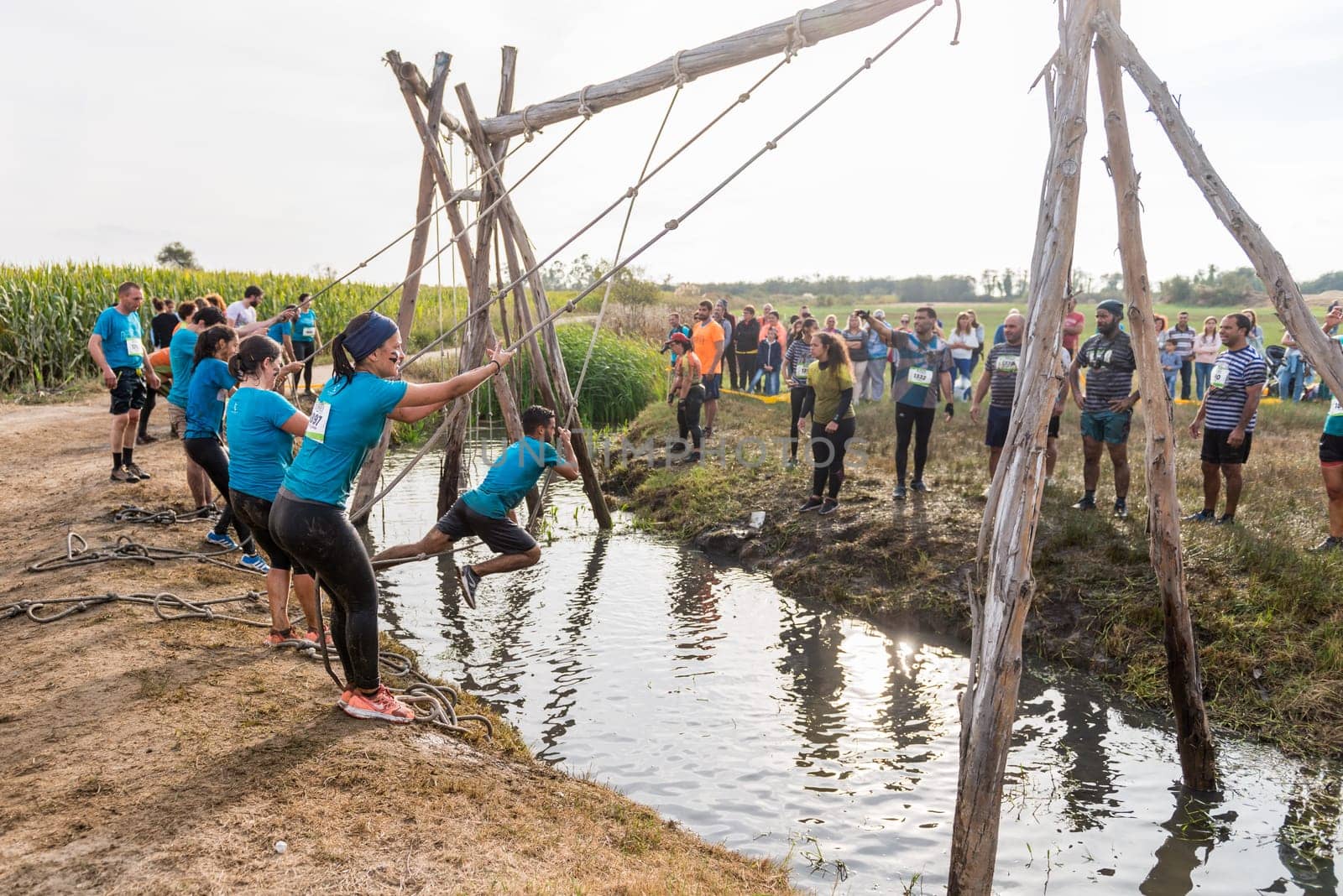 ESTARREJA, PORTUGAL - SEPTEMBER 23: Athletes go through mud and water at the Biorace on september 23, 2017 in Estarreja, Portugal.