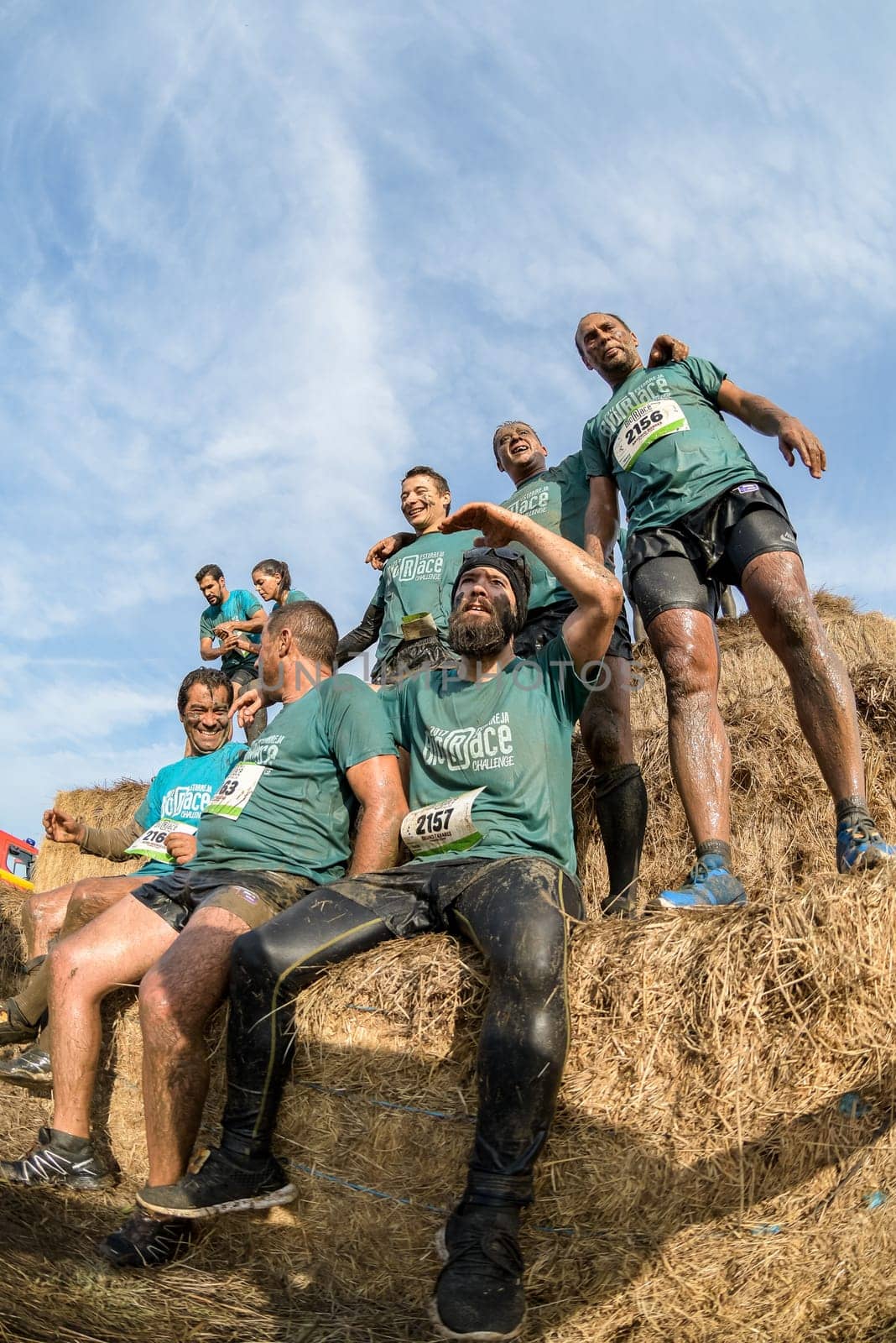 ESTARREJA, PORTUGAL - SEPTEMBER 23: Athletes overcoming the hay osbtacle at the Biorace on september 23, 2017 in Estarreja, Portugal.