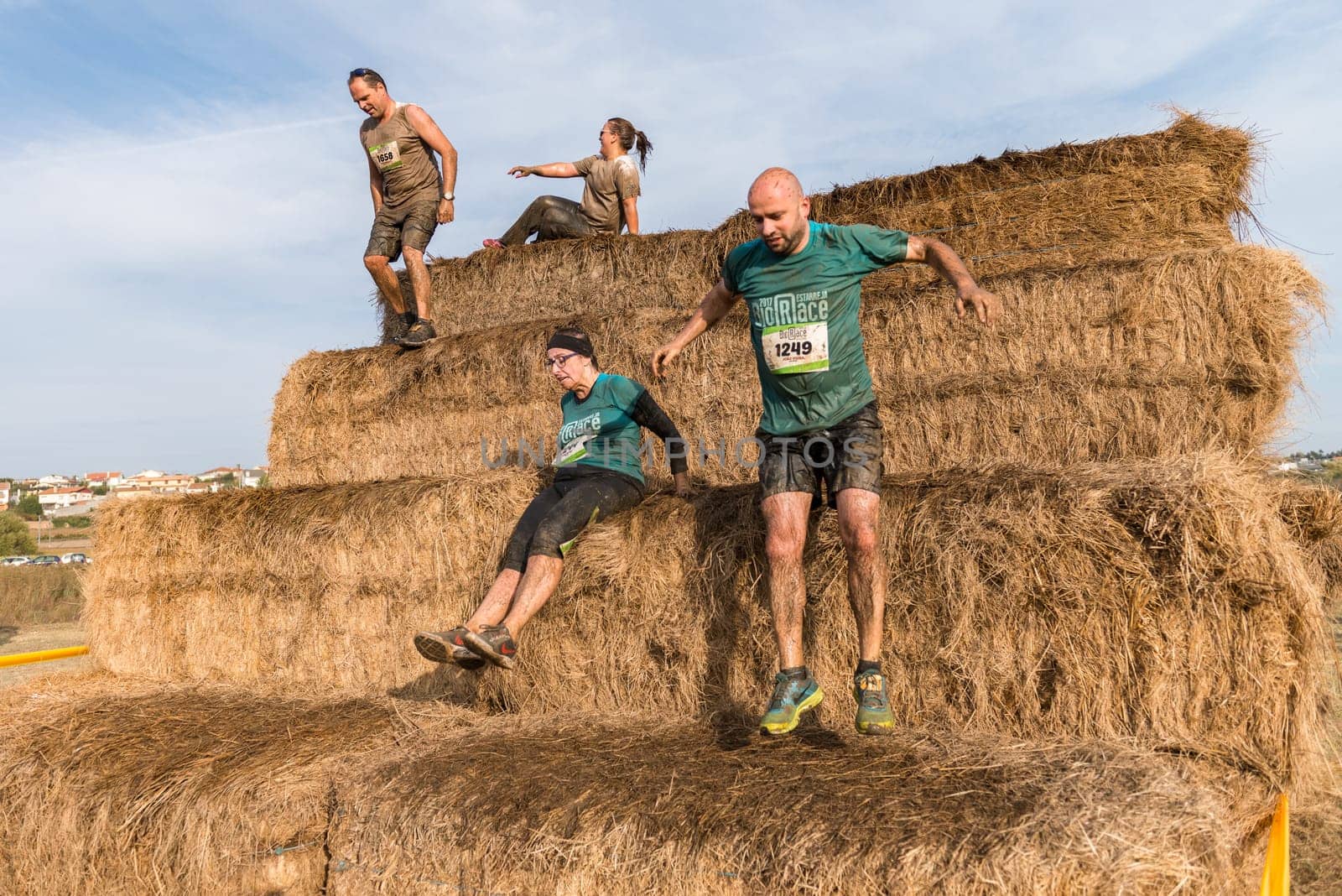 ESTARREJA, PORTUGAL - SEPTEMBER 23: Athletes overcoming the hay osbtacle at the Biorace on september 23, 2017 in Estarreja, Portugal.
