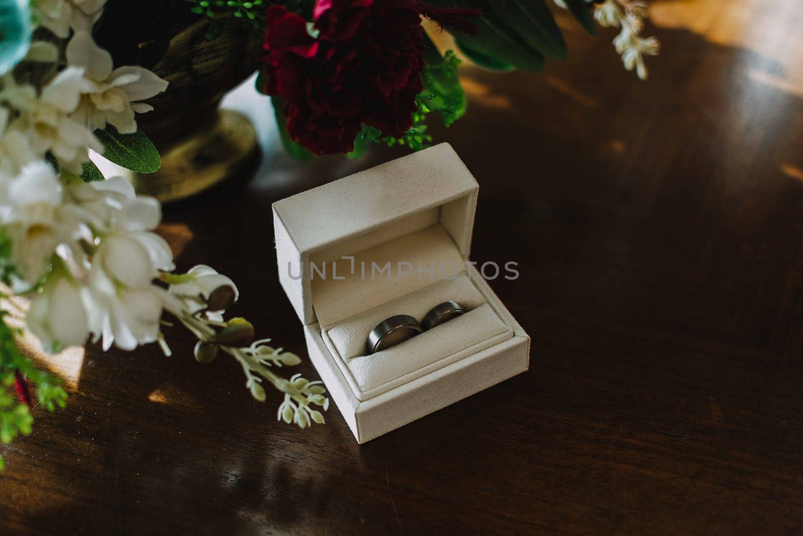 close up on wedding rings on the table