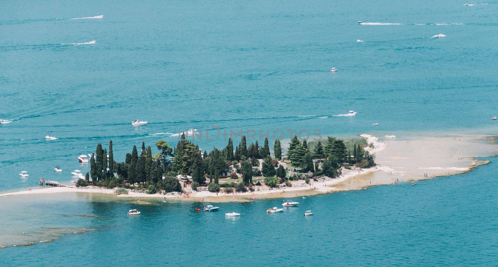 close up on small island on Garda Lake,Italy,low visibility