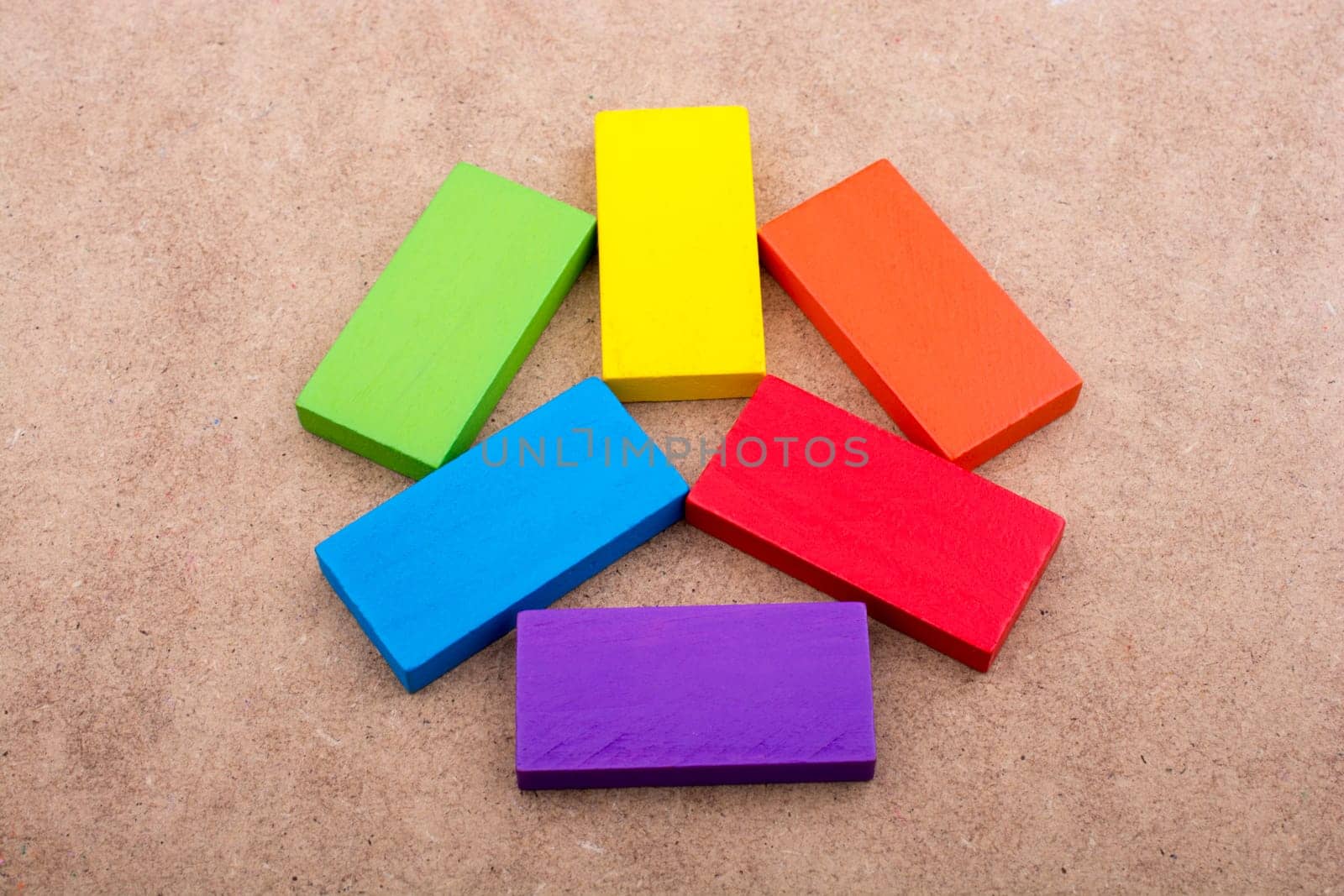 Wooden blocks on a brown background
