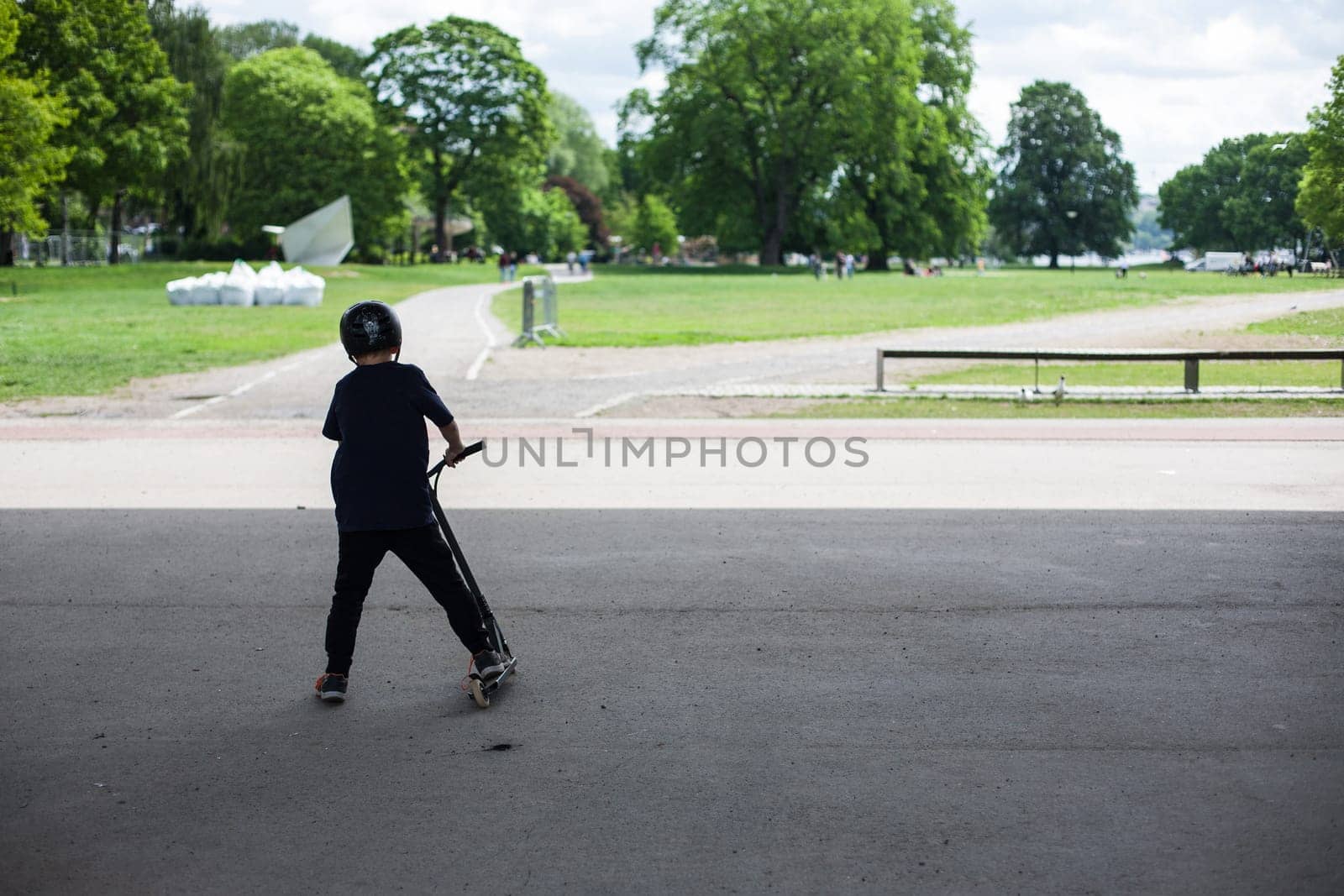 Powerful funny young guys are trained in a skate park Stockholm, Sweden. Leisure, playing, trick