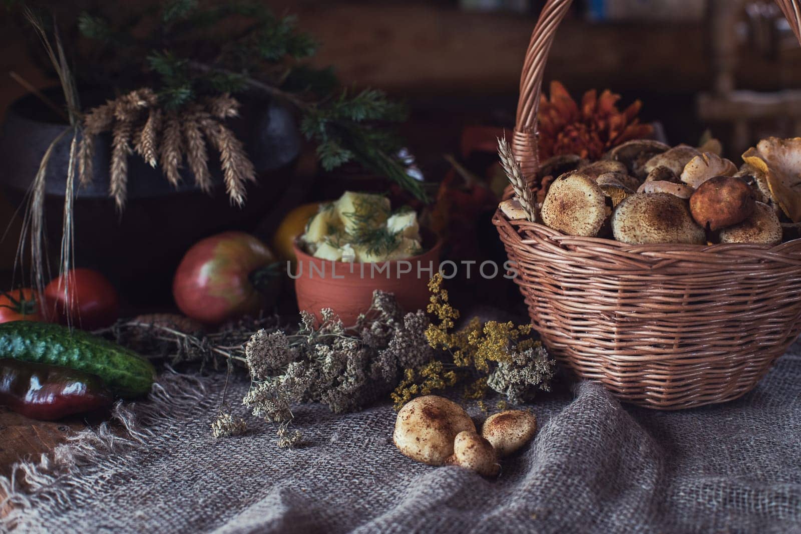 Still life from autumn nature gifts. mushrooms and vegetables