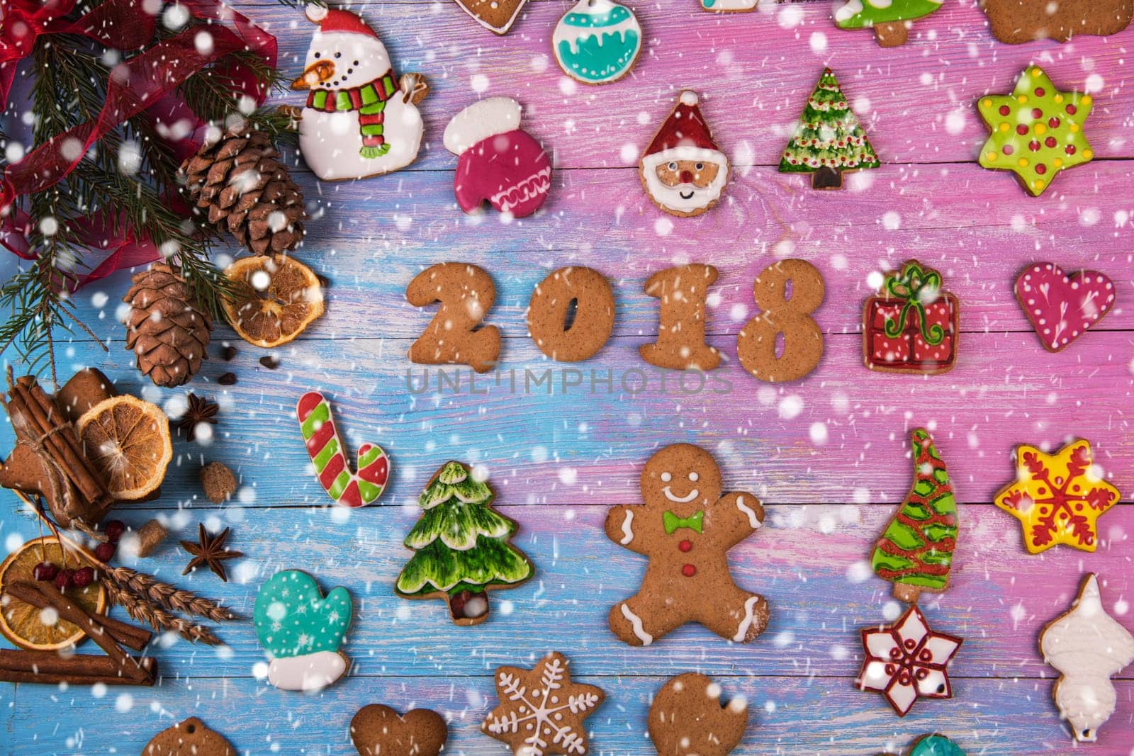 Gingerbreads for new 2017 year on wooden background, xmas theme