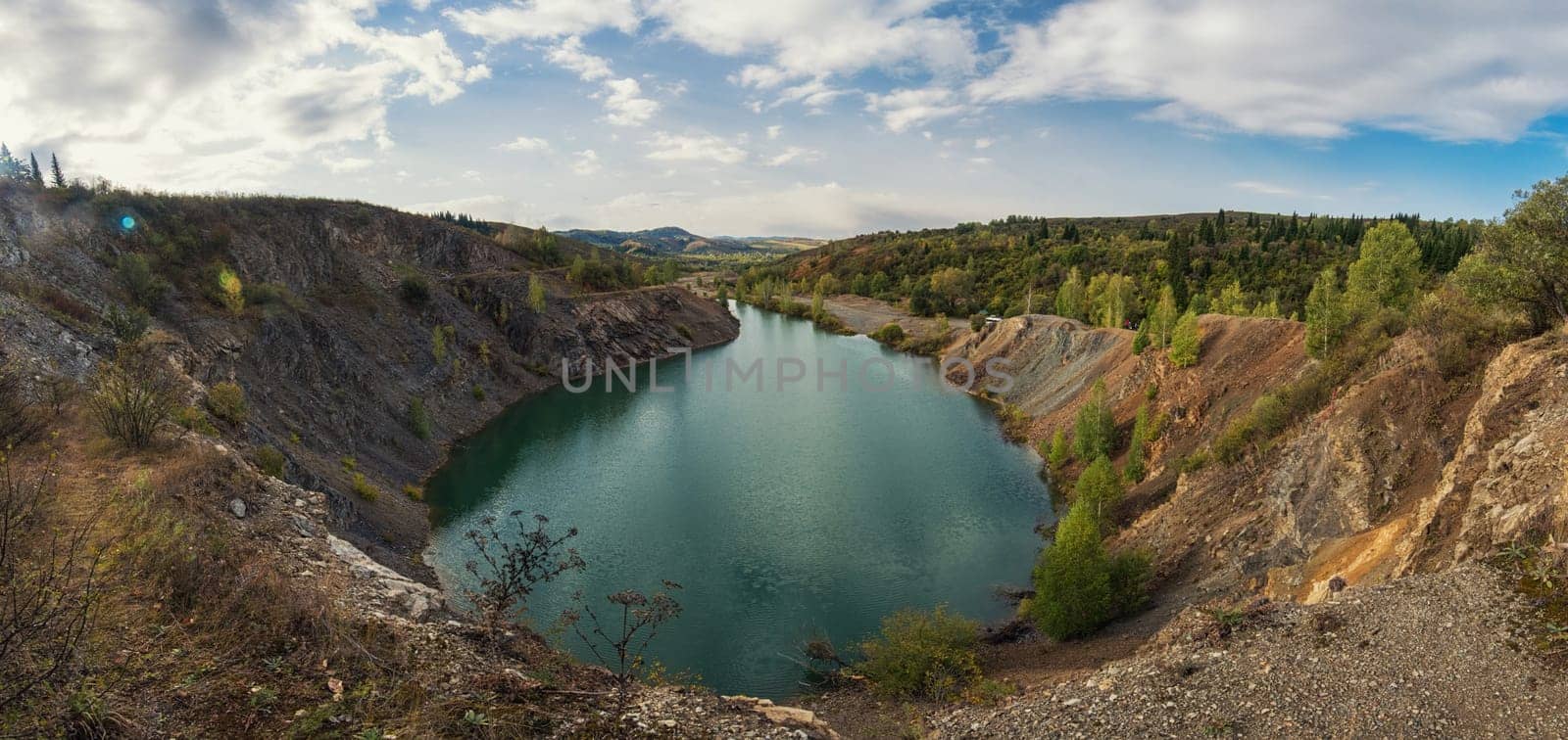 Blue lake in Altai. This is a former copper mine that was flooded with water