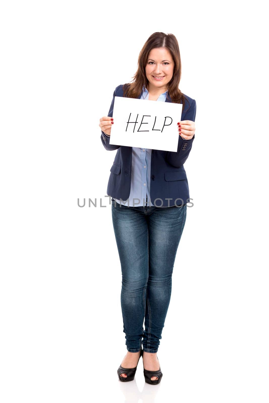 Business woman holding and working with a tablet, isolated over a white background
