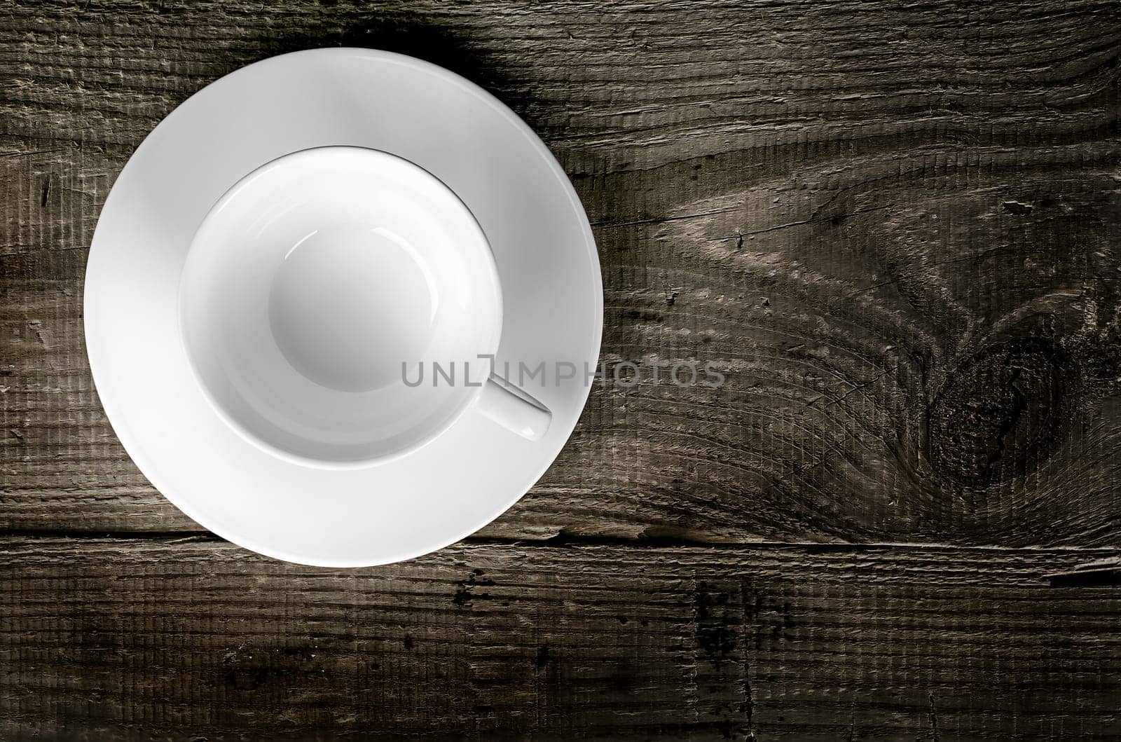Empty coffee cup on wooden table top view