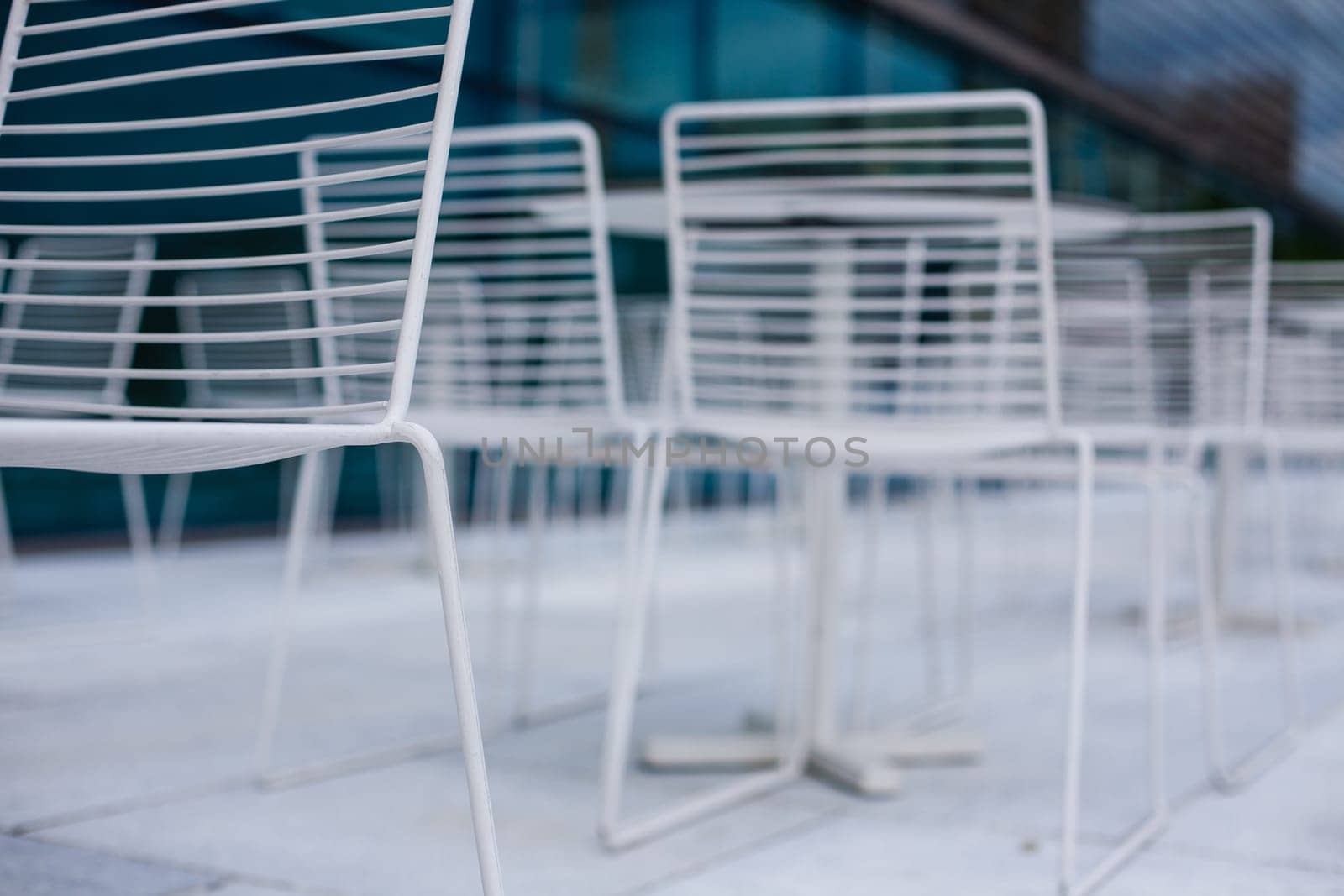 White empty chairs outdoors in Oslo, Norway