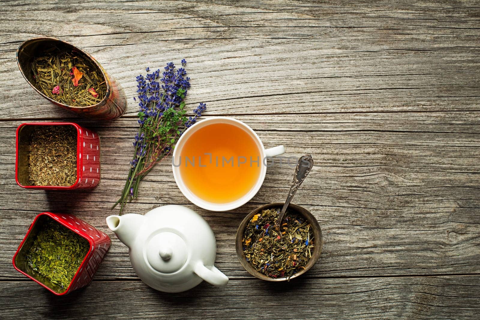 Cup of tea with dry tea collection of different types