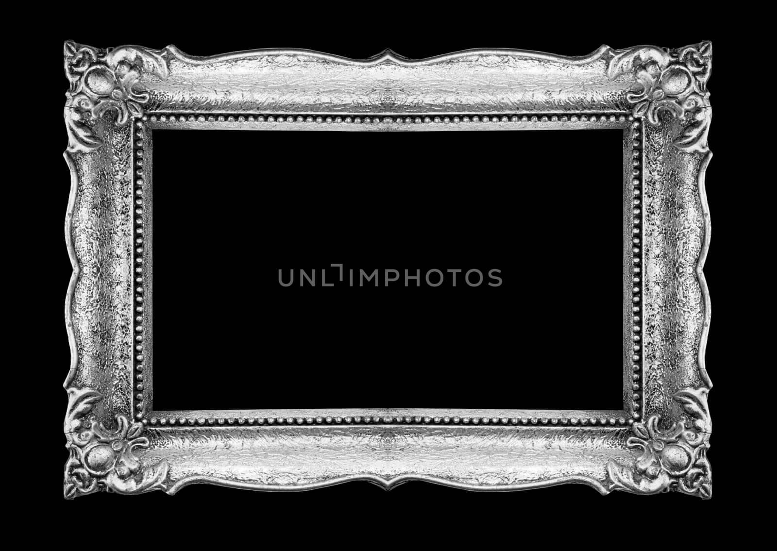 Old Picture Frame on black wall, silver metal