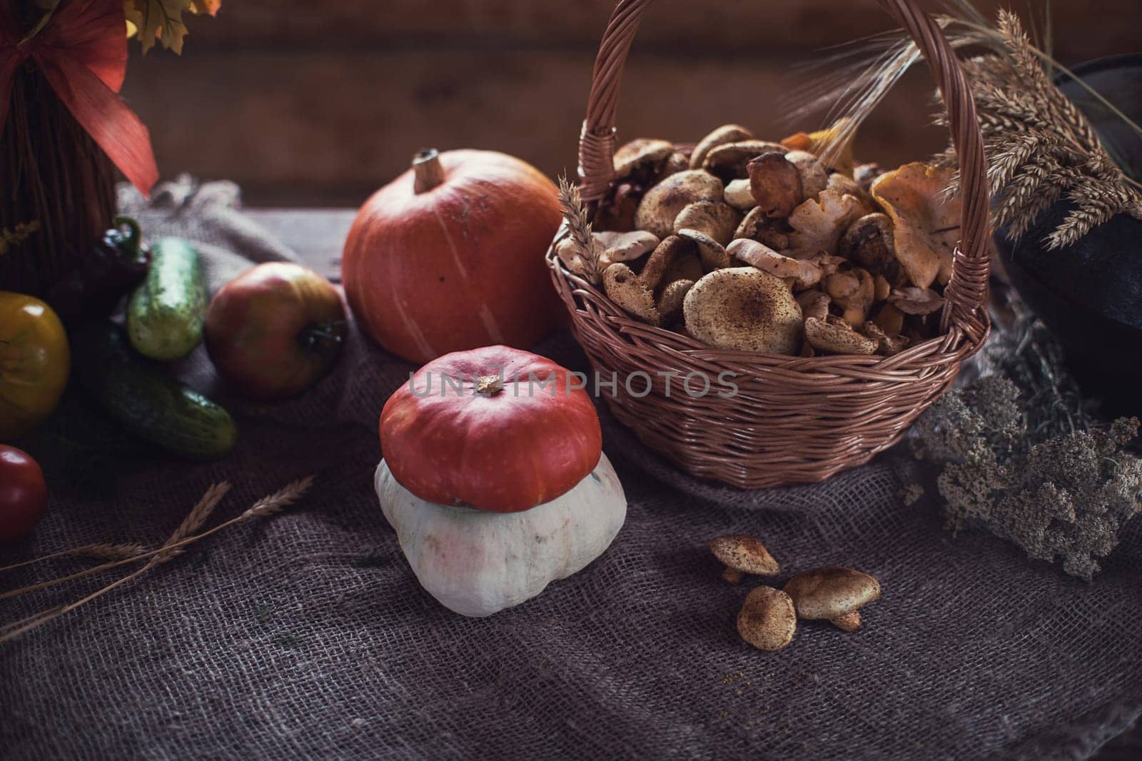 Still life from autumn nature gifts. mushrooms and vegetables