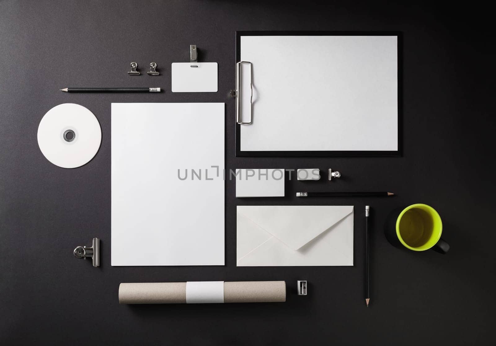 Blank stationery set on black background. Template for branding identity for designers. Top view.