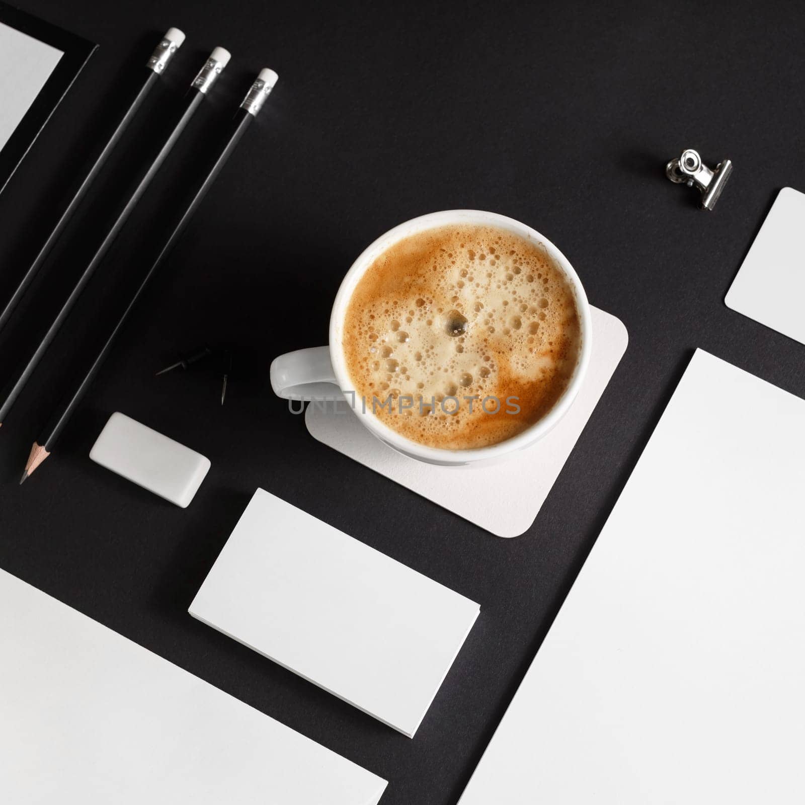 Branding template on black paper background. Blank stationery set. Mockup for corporate identity for placing your design.