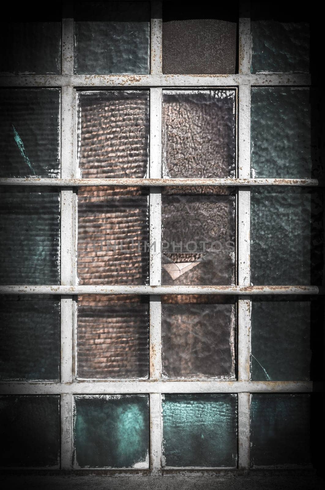 Vintage stained glass window texture background. Grungy styled.