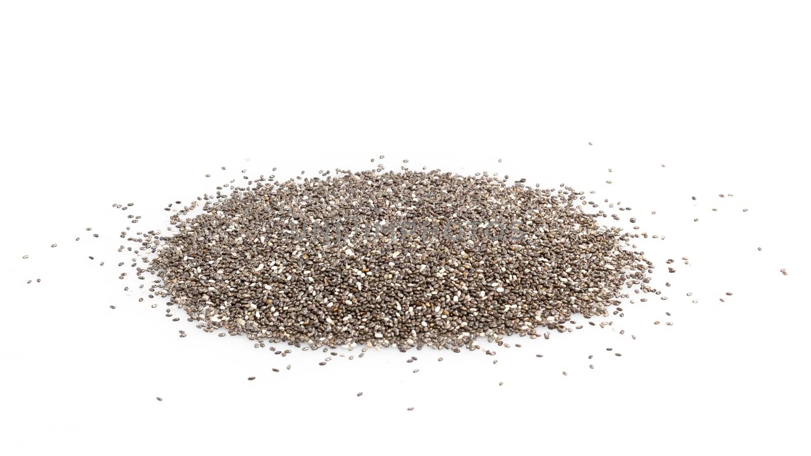 Pile of chia seeds close up on a white background