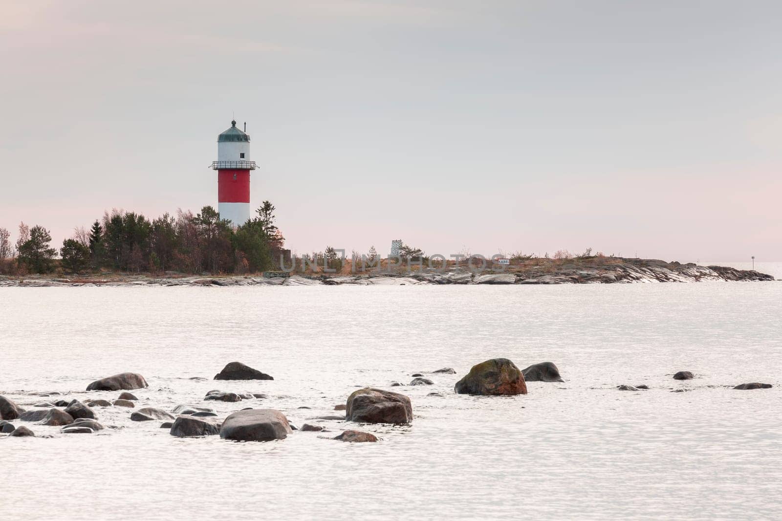 Light House in Holmsund, Sweden with a cloudy sky.