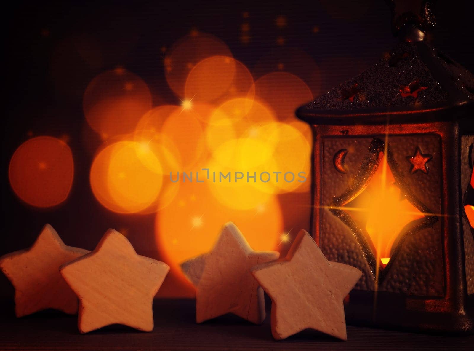 Christmas background with star shapes and candle lights