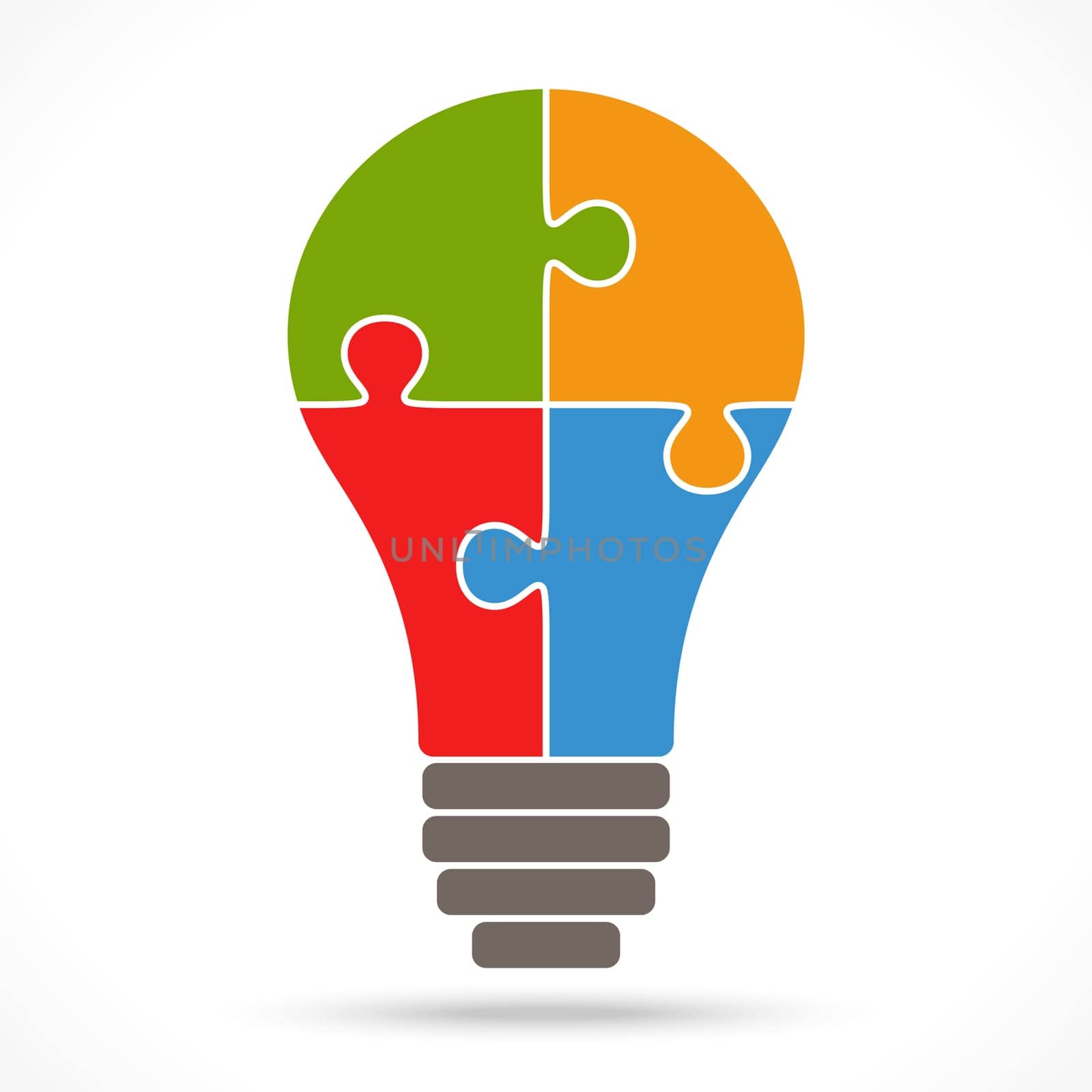 light bulb with four puzzle parts symbolizing teamwork ideas