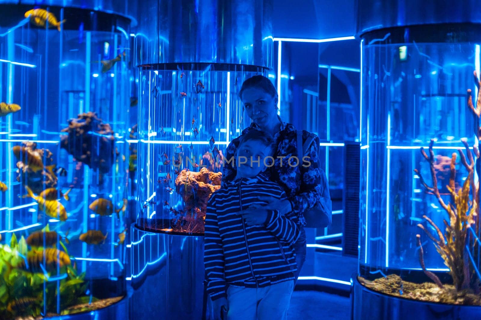 Photo of woman with son in the oceanarium