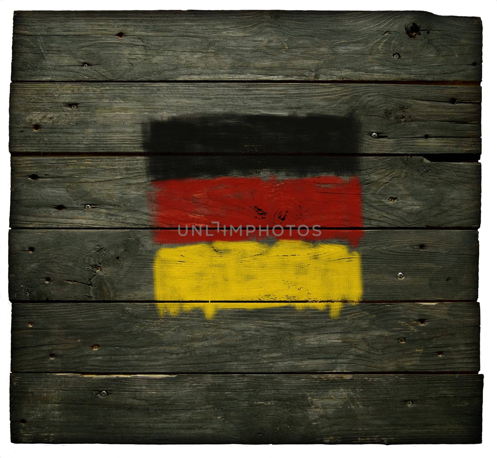 German flag on weathered board wall