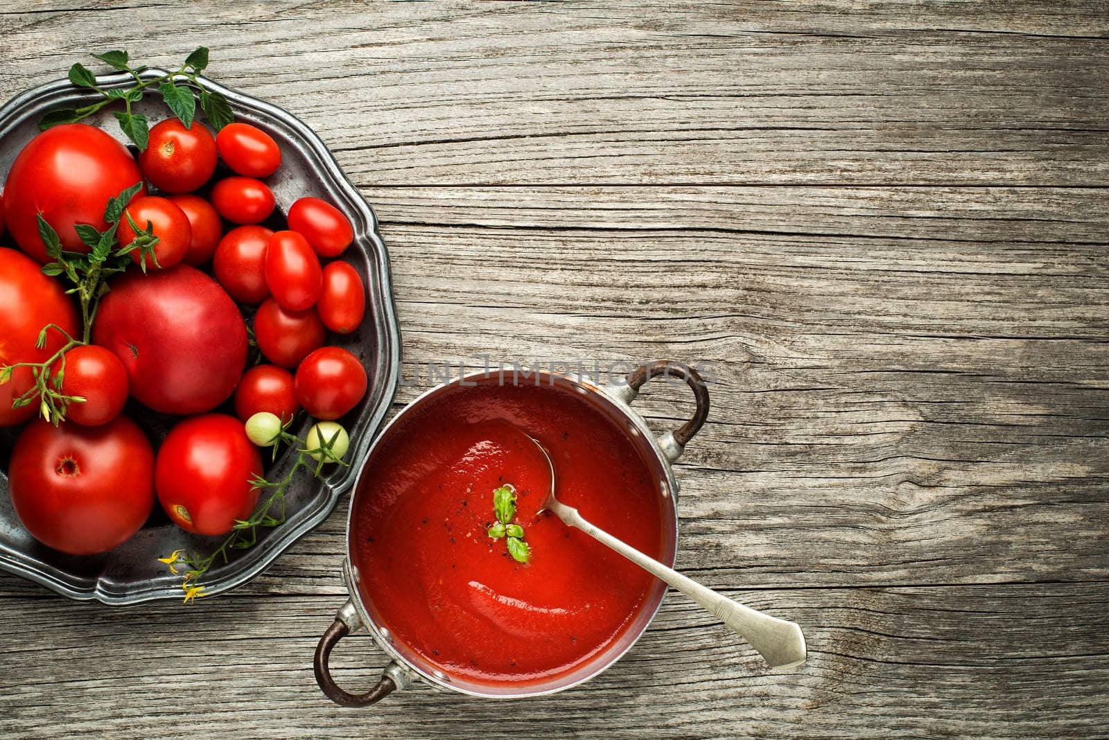 Fresh tomato sauce on wooden background. Top view