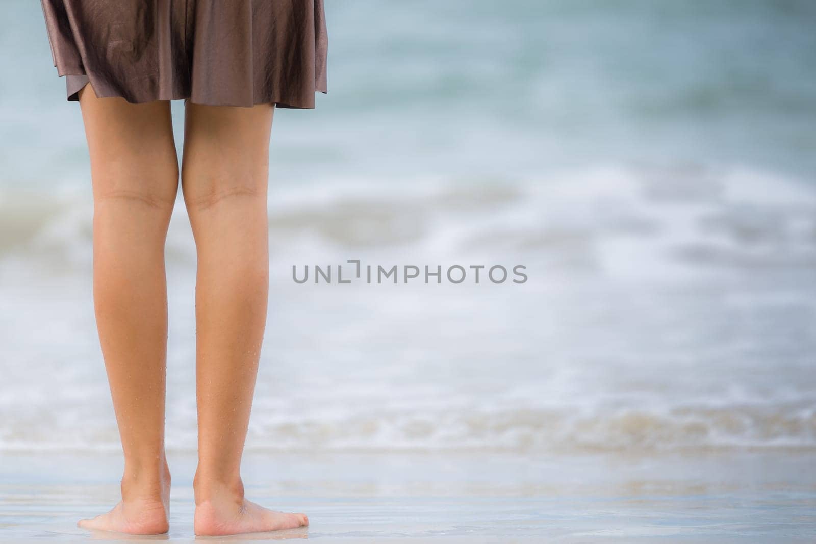 Beautiful Asian woman vacation on beach of Thailand.