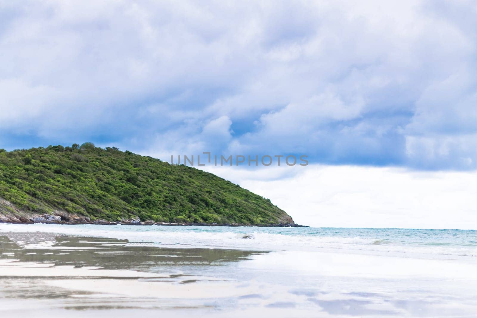 Beautiful tropical beach and sea on blue sky background