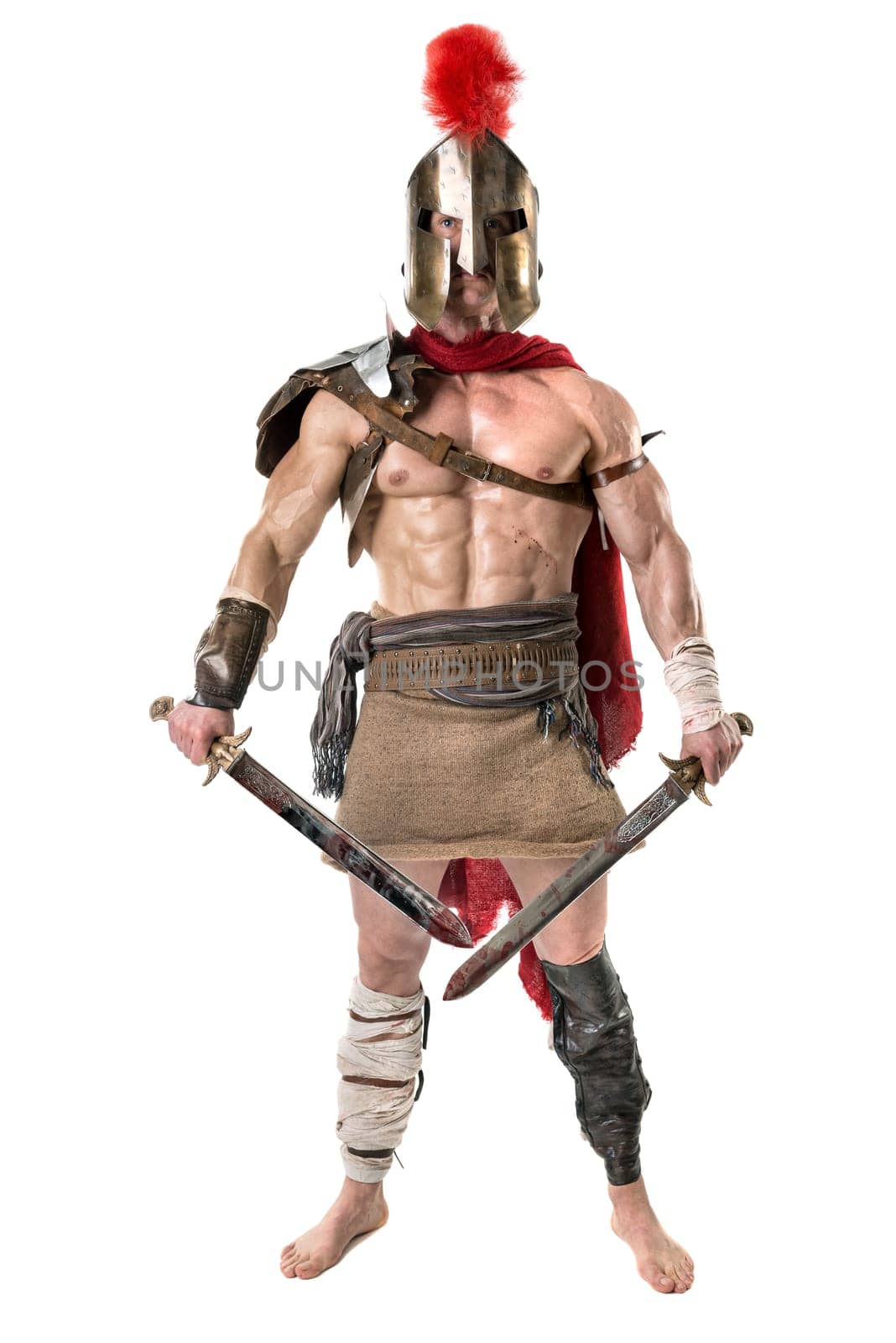 Ancient warrior or Gladiator posing over a white background
