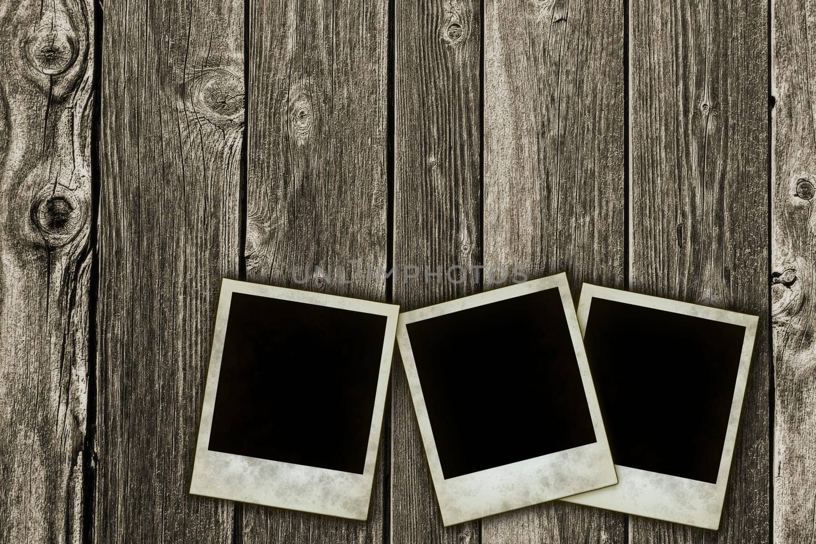instant pictures on wooden background