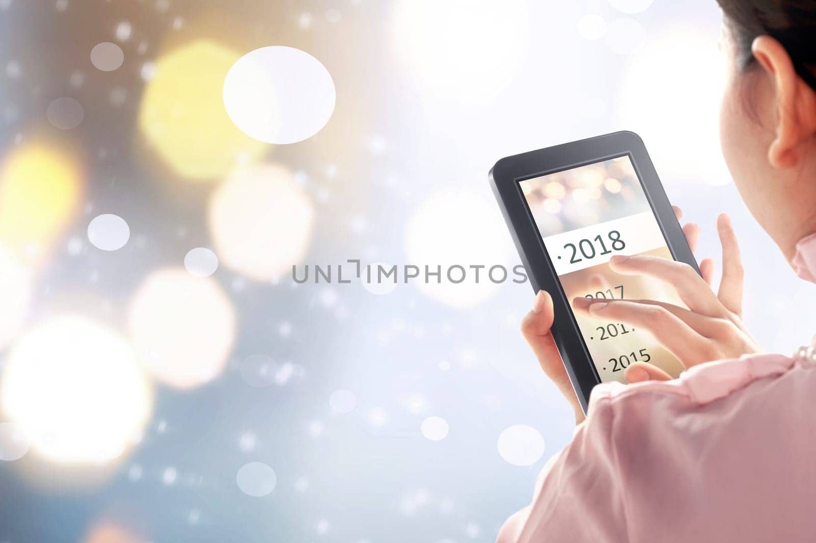 Asian woman touch tablet. Happy new year 2018