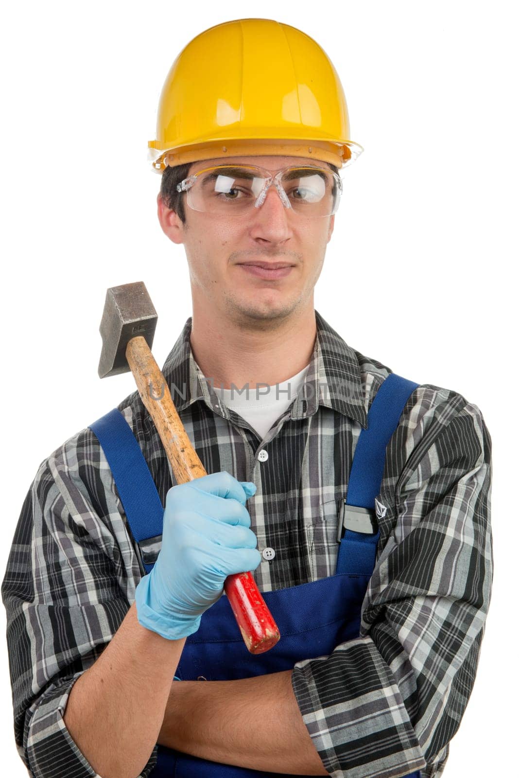 young worker with a hammer on the white background