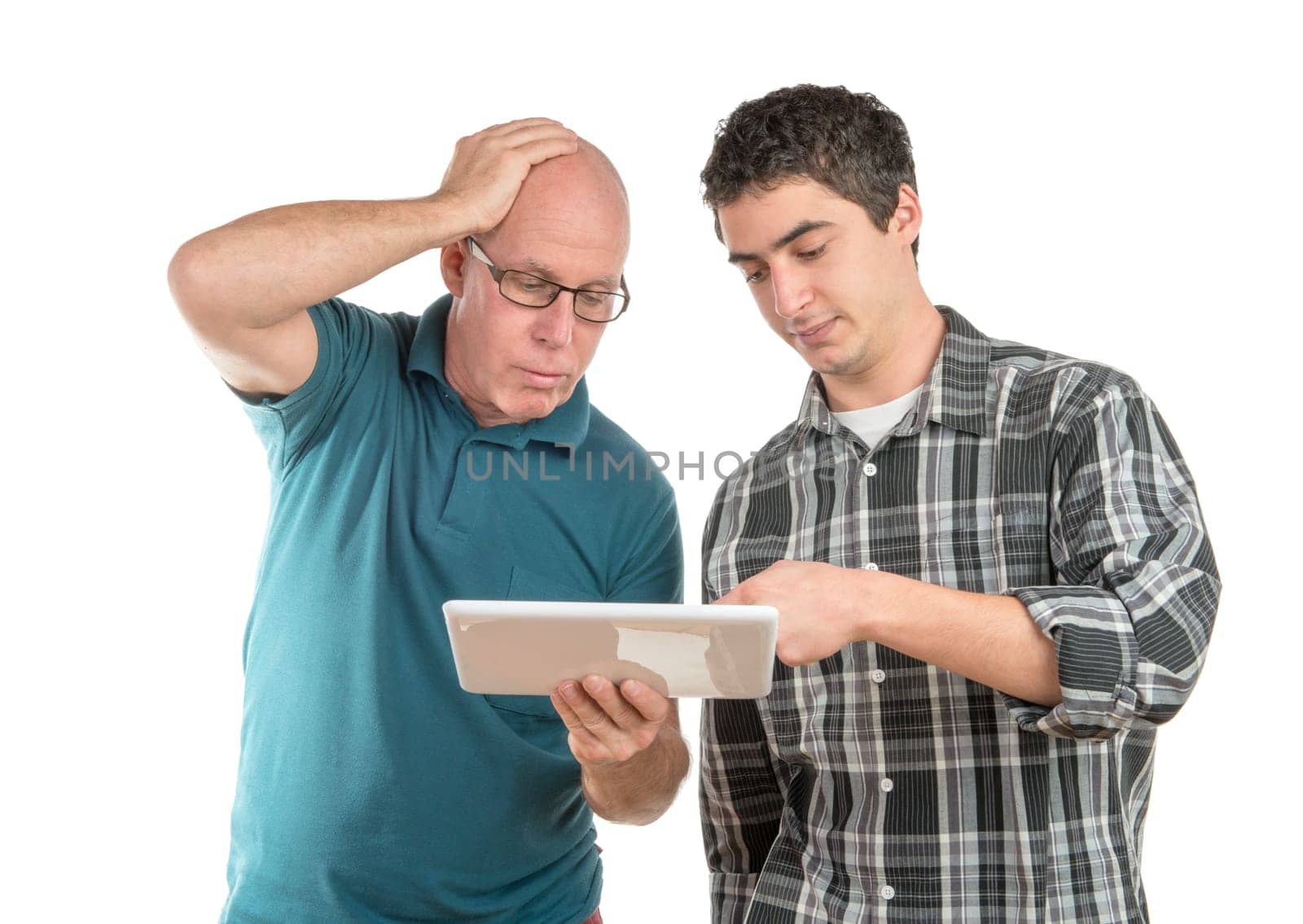 a son explains to his father the digital tablet